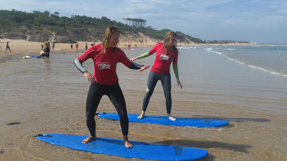 aprender a surfear en familia Loredo Surf School